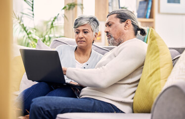 Canvas Print - Planning, laptop and senior couple on a sofa for streaming, sign up or subscription discussion in their home. Retirement, relax and old people online in a living room for internet, movie or search