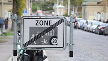 End Of Pedestrian Zone Road Sign, Establishing Shot Blurred Background