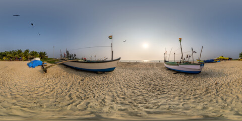 Wall Mural - 360 hdri panorama near old fishing boats in the sand on the ocean at sunset in equirectangular spherical seamless projection