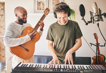 Happy, piano and friends with guitar recording music in home studio together. Electric keyboard, acoustic instrument or microphone of singer in band, headphones and team of men in production of sound