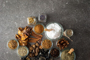 Wall Mural - Various spices, dried mushrooms, salt and pepper