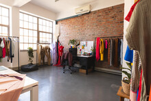 Designs On Desk, Colourful Clothes And Fabric In Sunny Studio