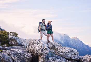 Sticker - Mountain, hiking view and man with woman on peak for adventure in nature, landscape and travel. Outdoor trekking, couple on cliff and relax in scenic clouds for natural journey, walking and looking.