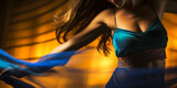 Sensual woman belly dancing fast, alone with motion blur effect.