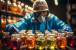 Scientist with mask, colorful liquids.
