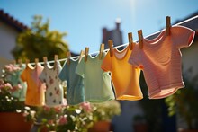 Baby Clothes Drying On Washing Line
