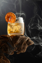 Poster - Smoked old fashioned cocktail with ice and dried orange slice.