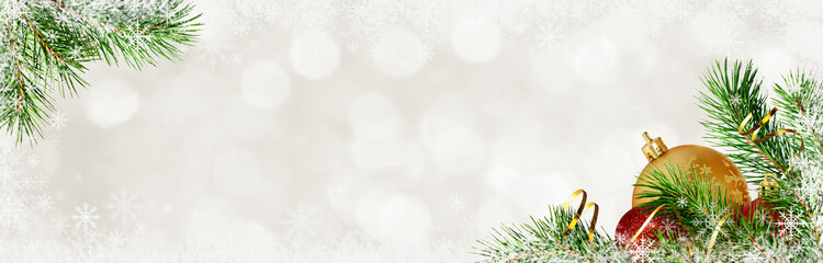 Wall Mural - Holiday background with pine twigs and Christmas decorations