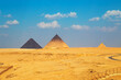 Great Egyptian pyramids. The black pyramid is an unusual natural phenomenon.