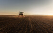 © Dusan Kostic - Farmer preparing his field in a tractor