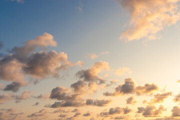 Wall Mural - Orange evening sky on a calm beach