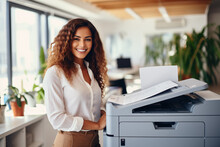 Office Worker Prints Paper On Multifunction Laser Printer. Document And Paperwork Concept. Secretary Work. Smiling Woman Working In Business Office. Copy, Print, Scan, And Fax Machine.
