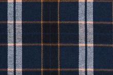 Blue, White And Orange Checked Tartan Fabric Texture Close-up. Image For Your Design. Material For Making Shirts