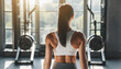 © Marko - Rear close up view fit strong beautiful sporty muscular athlete woman trainer bodybuilder back wear sportswear training in sunny gym indoors, bodybuilding workout exercises background concept