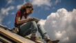 © PaulShlykov - Female Construction Worker On roof