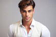 Elegant male model in white shirt with strong gaze