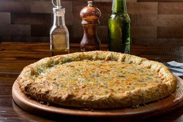 Wall Mural - pizza on a wooden table