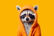 © ADDICTIVE STOCK - Generative AI illustration of captivating raccoon wrapped in an orange hoodie peering intently from a bright yellow background