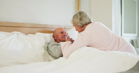 Poster - Senior, couple and kiss forehead in bed for support, sick and conversation with retirement or healing. People, man and woman in bedroom with communication, empathy and love for trust, care and rest