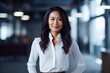 © JuanM - Smiling business woman looking at the camera