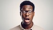 © Hifzhan Graphics - Portrait of a black male wearing glasses with Shocked expression against white background, AI generated, background image