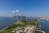 Fototapeta  - Aerial view of Governors Island with  Manhattan and Brooklyn in the background, New York City, USA