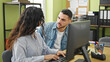 © Krakenimages.com - Man and woman business workers using computer working at the office