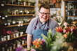 Smiling happy boy with down syndrome as flower seller in flower shop.generative ai
