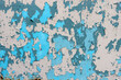 Blaues Metall mit verwitterten Farbresten. Abstrakte Formen. Hintergrund.