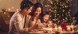 © ETAJOE - Asian Family celebrating christmas new year and. Home holiday and Christmas tree