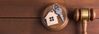 wooden judge and house model with key