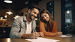 © Artofinnovation - Happy attractive couple signing prenup or home purchase agreement
