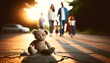 A teddy bear sits abandoned on a cracked street, its plush form a stark contrast to the harsh asphalt. In the blurred background, a family walks away, unaware or perhaps moving on.