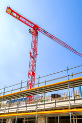 Poster - modern crane at a construction site