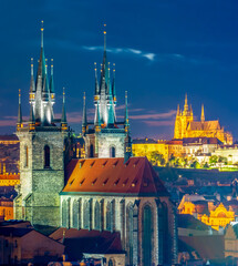 Poster - Prague cityscape at night with church of Our Lady before Tyn and Prague castle at background, Czech Republic