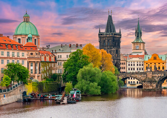 Poster - Prague medieval architecture near Charles bridge over Vltava river at sunset, Czech Republic