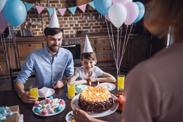 Wall Mural - Family celebrating birthday