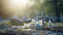 A Solemn Catholic Cemetery With A Grave Marker And Cross Engraved On It, Set Against A Softly Blurred Background. Funeral Concept