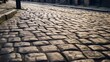 A close-up of textured cobbled street with worn cobblestones and character