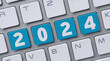 A computer keyboard with the word 2024