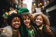 young kids smiling in green costumes in crowd of people celebrating saint Patrick day Irish holiday
