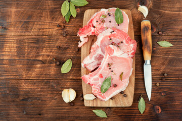 Wall Mural - Raw fresh pork steak in spices.