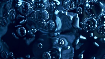 Poster - Super Slow Motion of Bubbling Blue Water in Detail. Extreme Macro Shot, Abstract Texture. Filmed on High Speed Cinema Camera, 1000 fps.