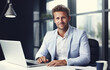 © GustavsMD - Man Working At Laptop In Contemporary Office