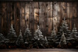 many small Christmas tree aligned with woody frame at the back for the Christmas night celebration Christmas wooden background