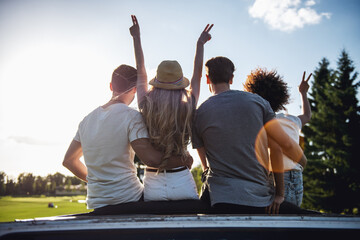 Poster - Friends travelling by car