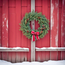 Green Christmas Wreath On Red Barn Door With Snow
