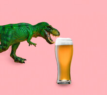 Funny Green Dinosaur With Big Beer Glass On Pink Background. Creative Minimal Art Collage.