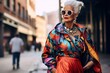 Elegant senior woman in flamboyant streetwear and sunglasses, exuding confidence in an urban setting