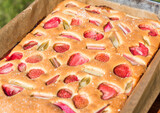 Fototapeta Na ścianę - Delicious cake with strawberries and rhubarb